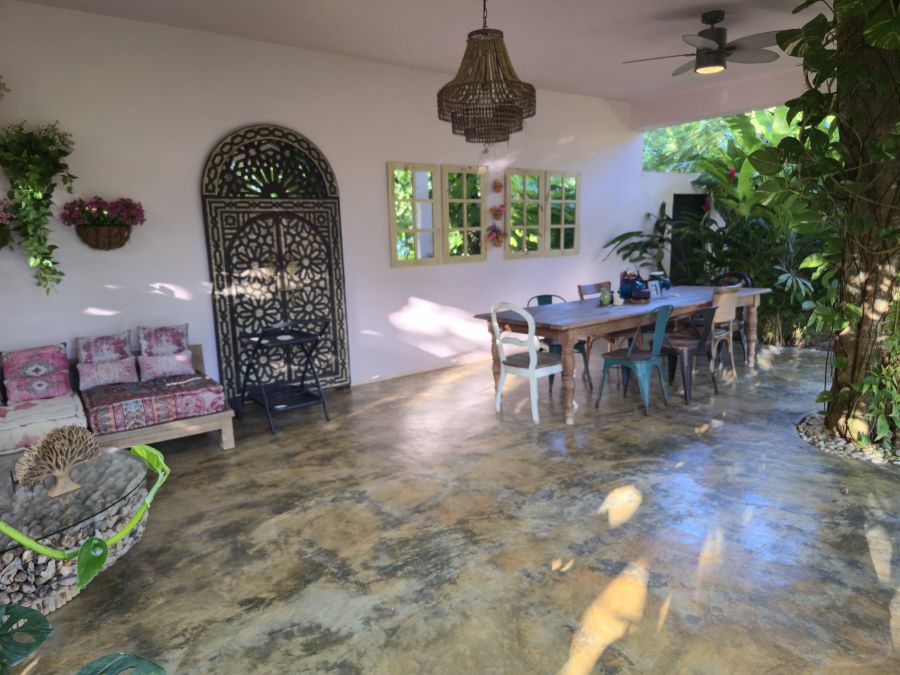 The covered terrace, lounge and dining area
